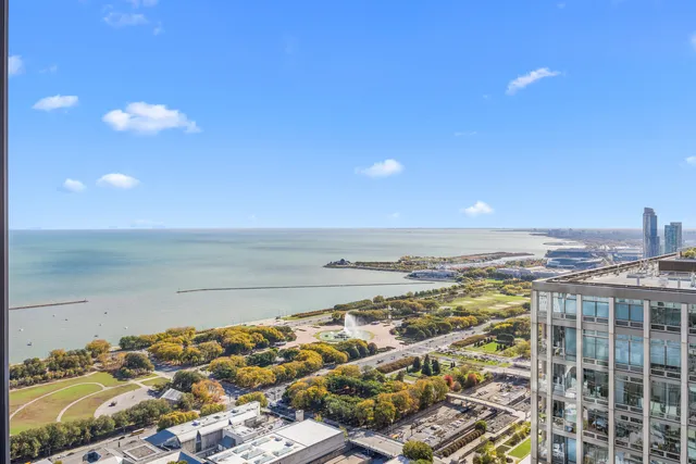 a kitchen with sink refrigerator and stove
