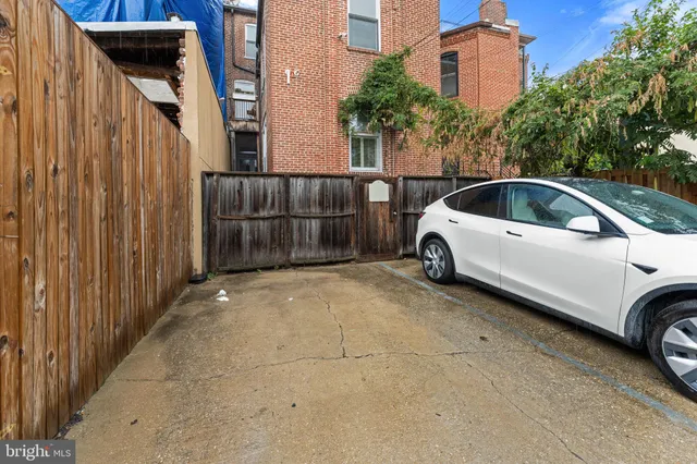 a view of a balcony with chairs