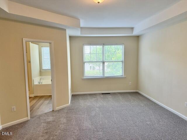 8227 Primanti Boulevard Raleigh, NC 27612 - Photo 14 of 25 an empty room with a window