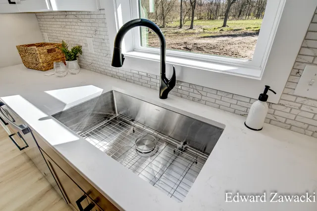 $699,000 | 397 Rogue River View Drive Northeast, Rockford, MI 49341