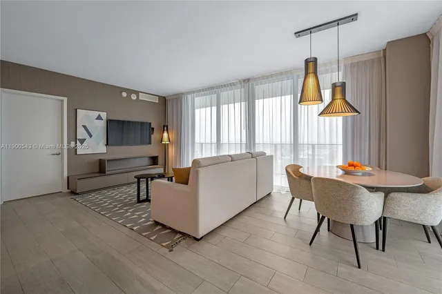 a kitchen with a sink cabinets and window