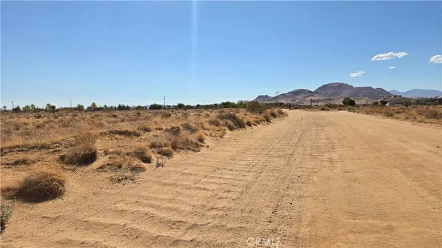 a view of ocean and mountains