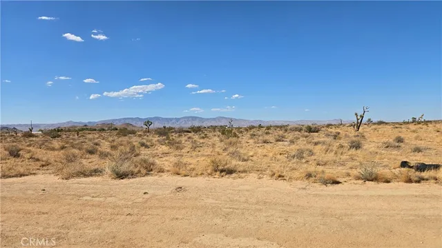 a view of ocean view with beach and mountain