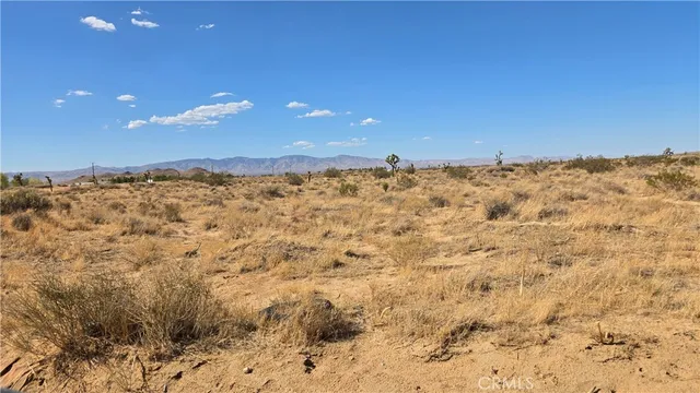 a view of ocean and a mountain