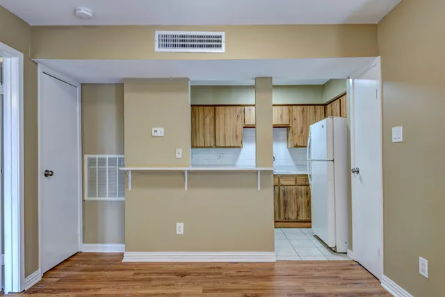 a view of kitchen and living room