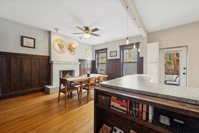 a view of a dining room with furniture window and wooden floor
