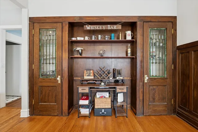 a view of a livingroom with furniture and wooden floor