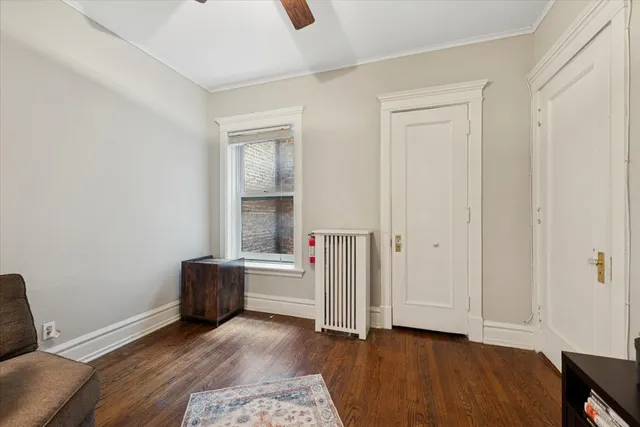 an empty room with furniture and entryway
