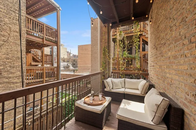 a patio with table and chairs