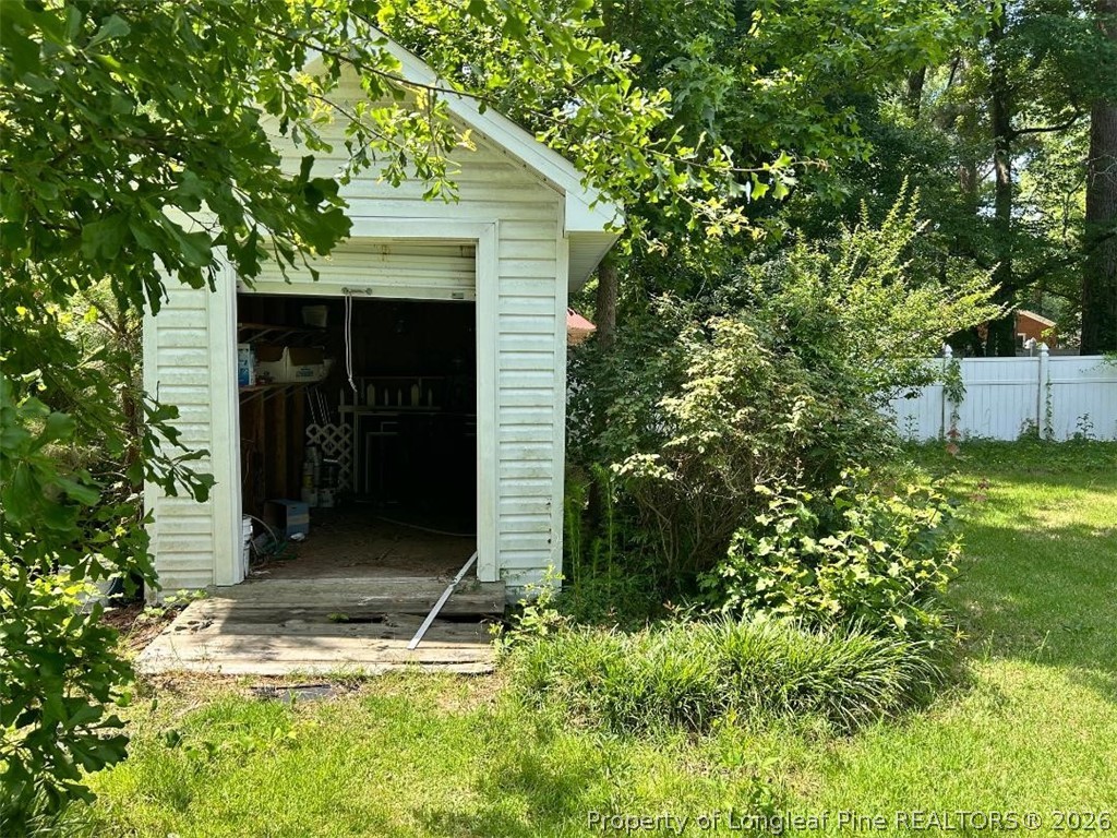 3085 Westminster Road Lumberton, NC 28360 - Photo 17 of 19 a view of a backyard of the house