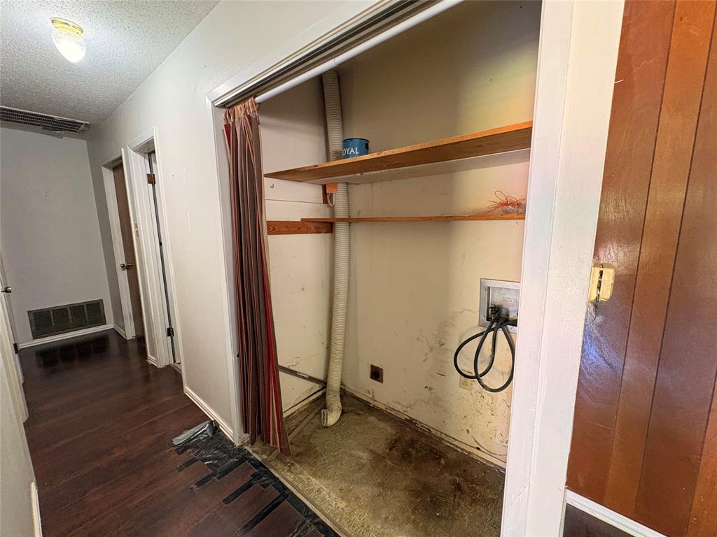 1829 South Center Street Denison, TX 75021 - Photo 15 of 29 a view of a room with wooden floor and windows