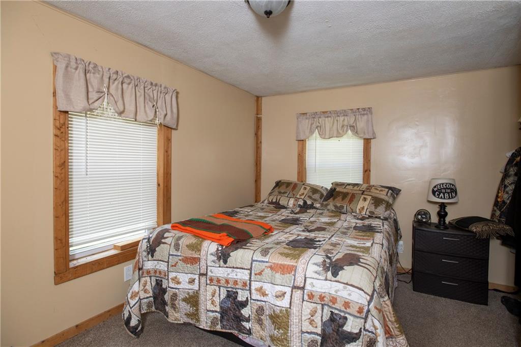 9133 South Watson Run Road Meadville, PA 16335 - Photo 25 of 45 a bedroom with a bed and a window
