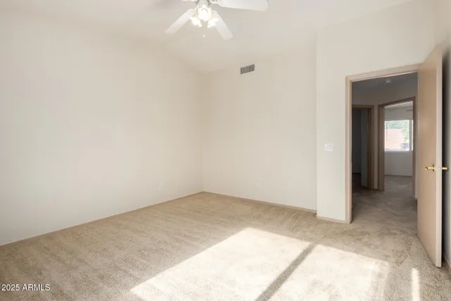 an empty room with a bathroom