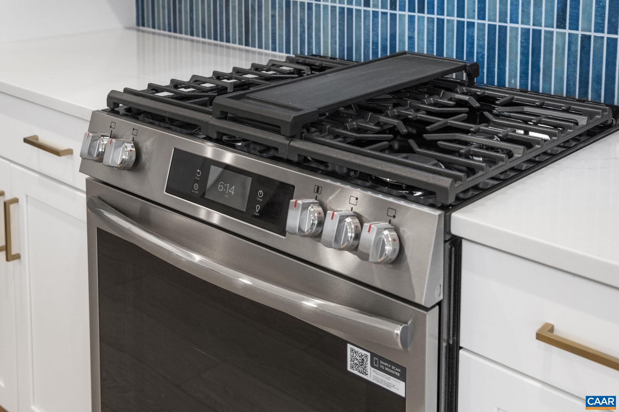 321 Springdale Road Waynesboro, VA 22980 - Photo 14 of 49 a close up of a stove sitting inside of a kitchen