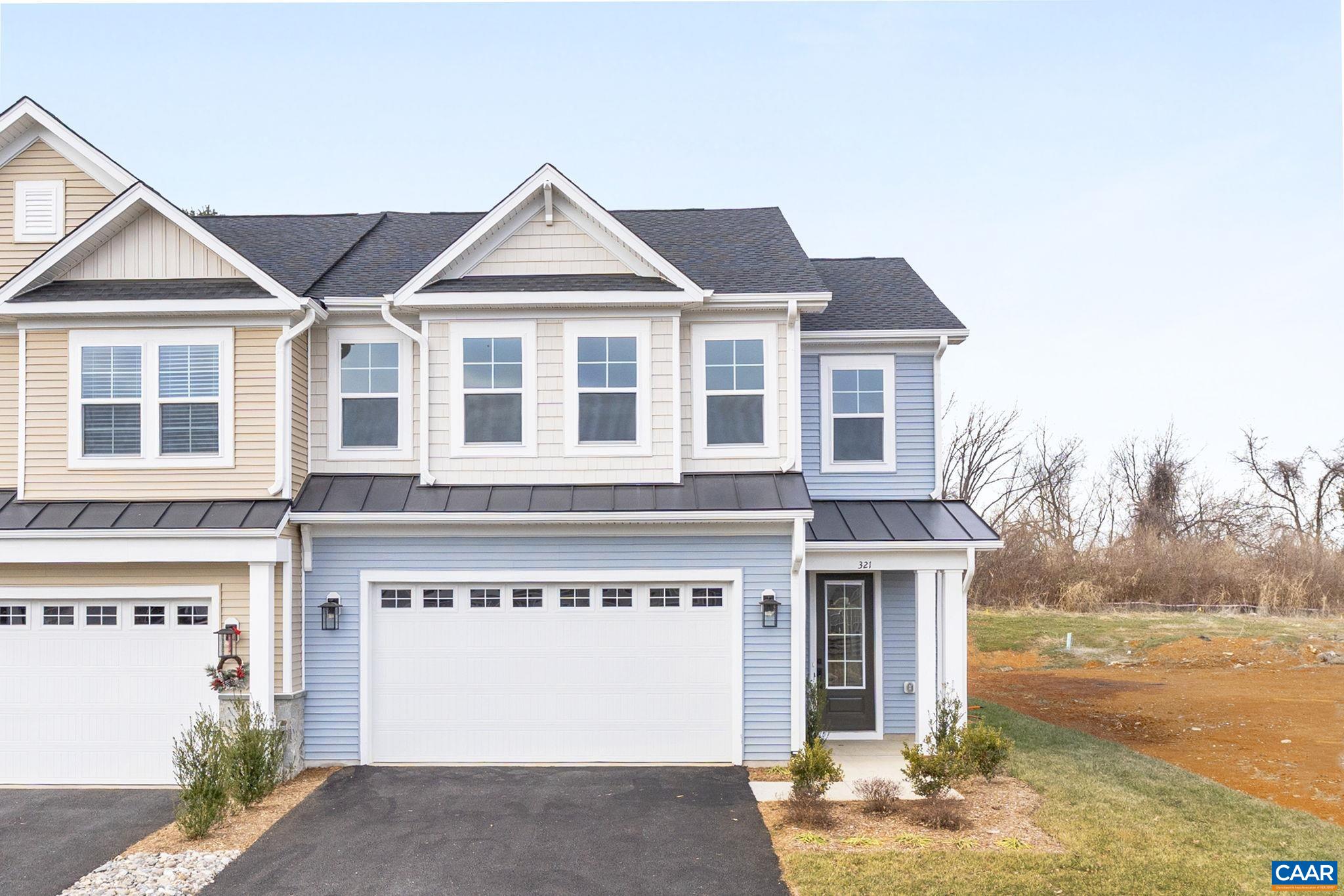 321 Springdale Road Waynesboro, VA 22980 - Photo 3 of 49 a front view of a house with a yard and garage