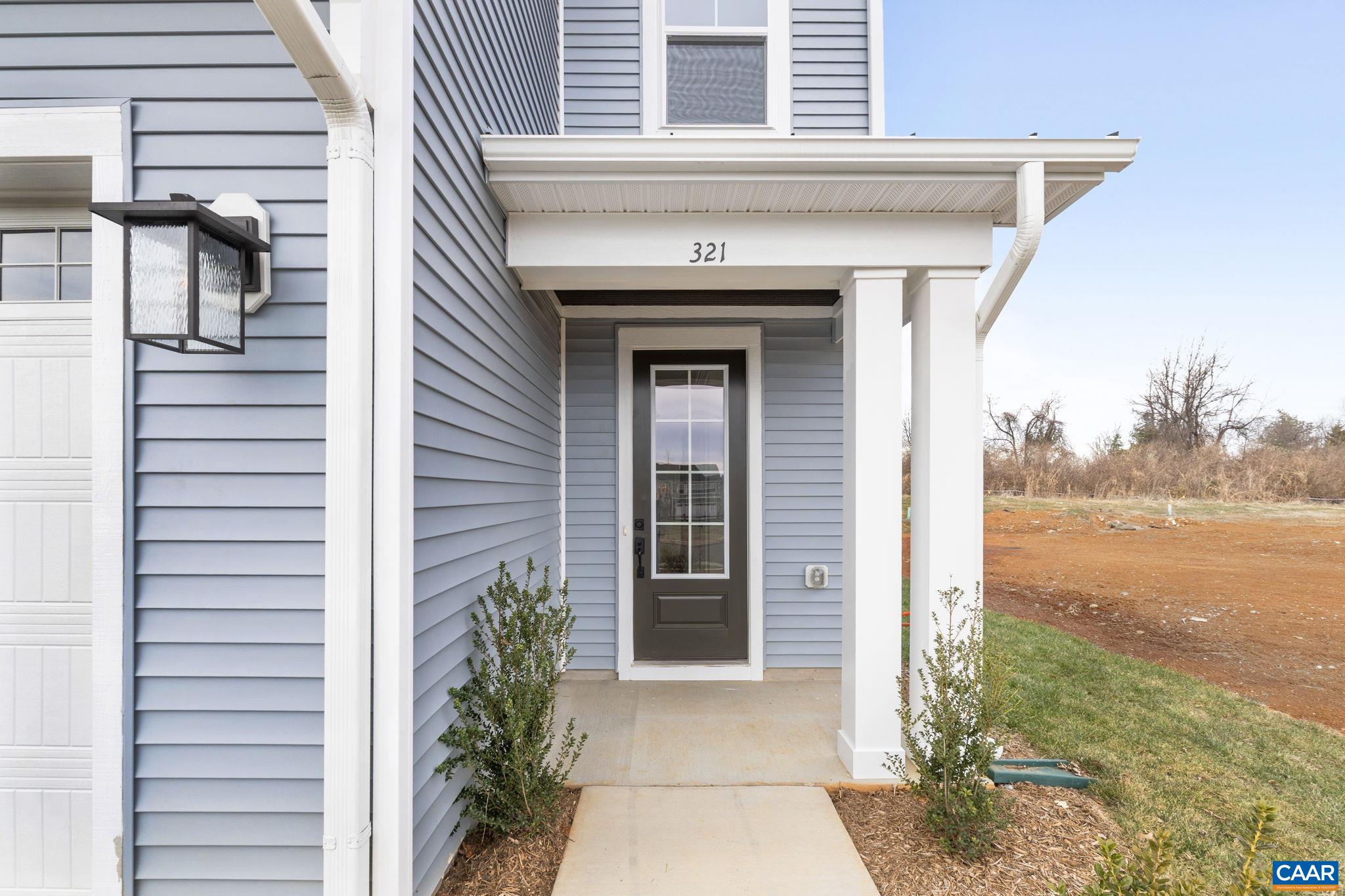 321 Springdale Road Waynesboro, VA 22980 - Photo 4 of 49 a front view of a house with a yard
