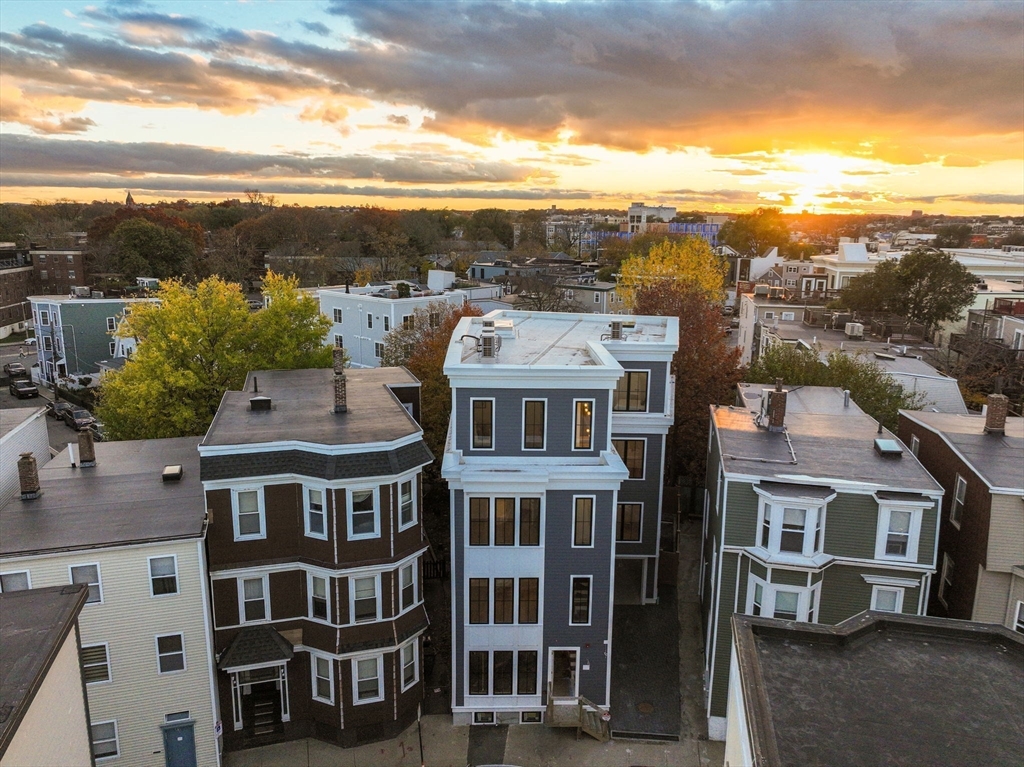 34 Vinton Street, Unit 3 Boston, MA 02127 - Photo 23 of 29 a view of a city with tall buildings