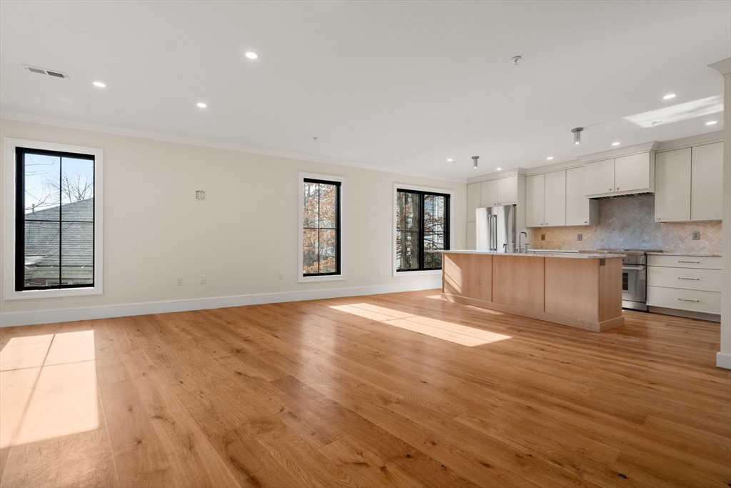 34 Vinton Street, Unit 3 Boston, MA 02127 - Photo 8 of 29 a view of kitchen with wooden floor