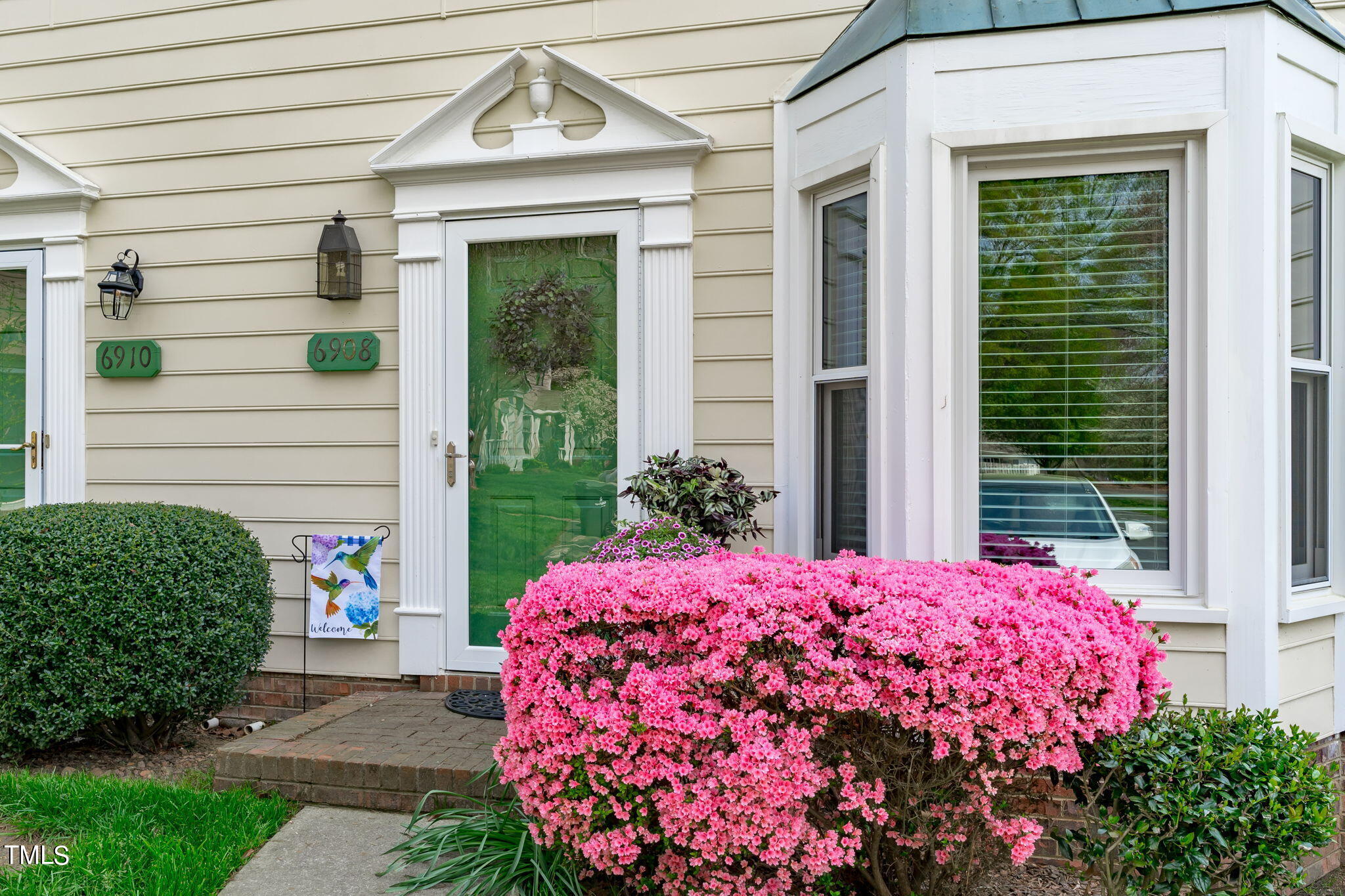 6908 Saxby Court Raleigh, NC 27613 - Photo 3 of 27 a view of a house with a potted plant