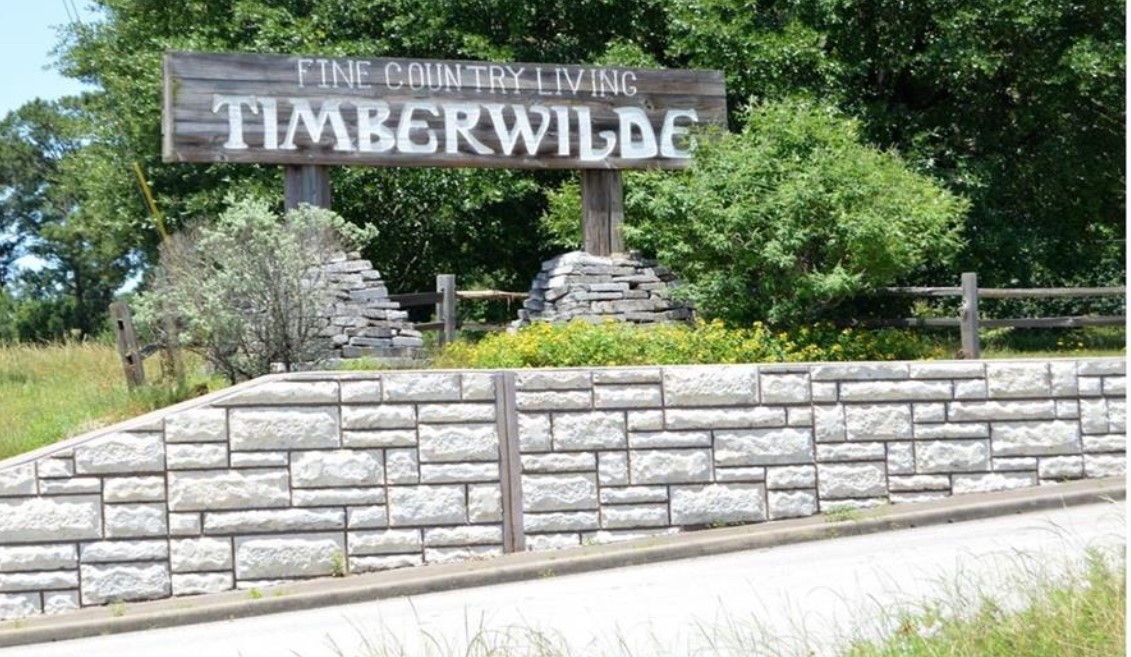 a street sign on a street next to a road