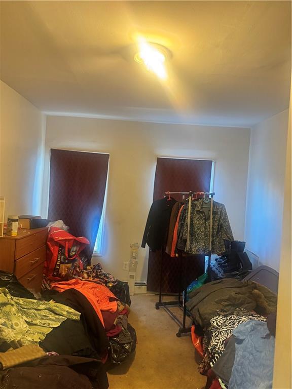 756 Linwood Street Brooklyn, NY 11208 - Photo 15 of 17 a bedroom with a bed and a closet