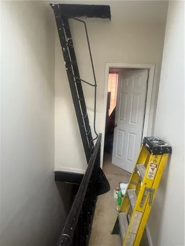 a view of an entryway with staircase