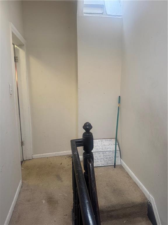 756 Linwood Street Brooklyn, NY 11208 - Photo 17 of 17 a view of a hallway with workspace