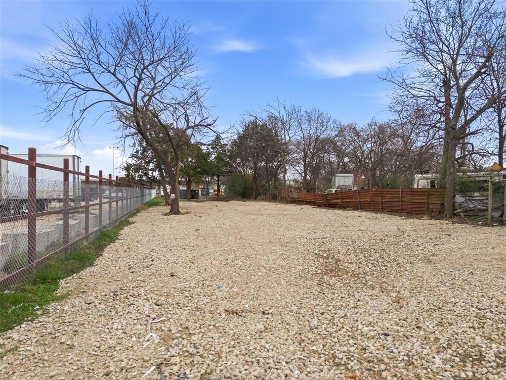8322 Honeysuckle Lane Dallas, TX 75241 - Photo 12 of 15 a view of snow on the road