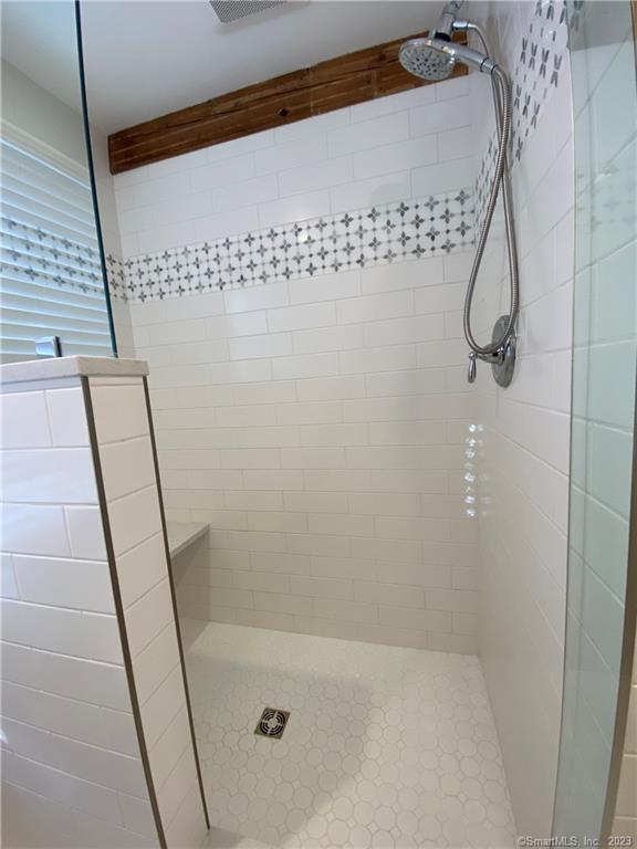 6 West Main Street Chester, CT 06412 - Photo 19 of 37 a bathroom with a shower