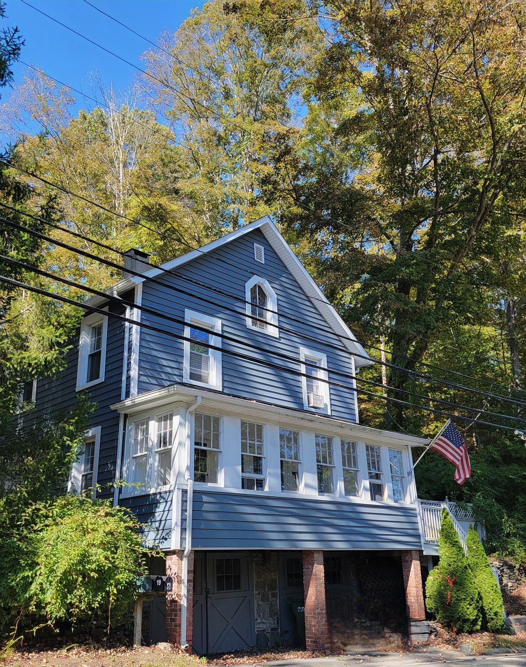 6 West Main Street Chester, CT 06412 - Photo 2 of 37 a view of a house with a yard