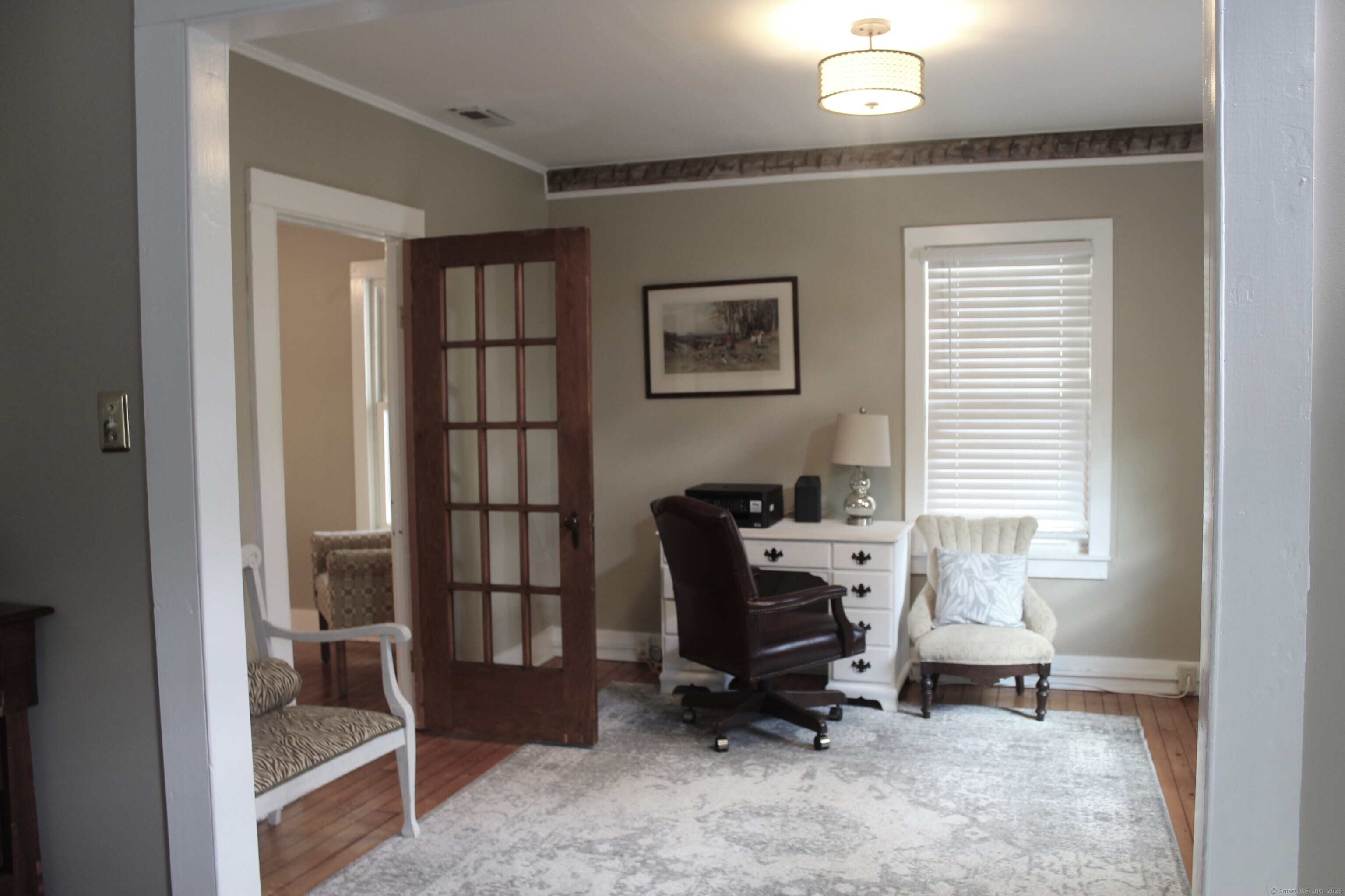 6 West Main Street Chester, CT 06412 - Photo 30 of 37 a view of a workspace with a window