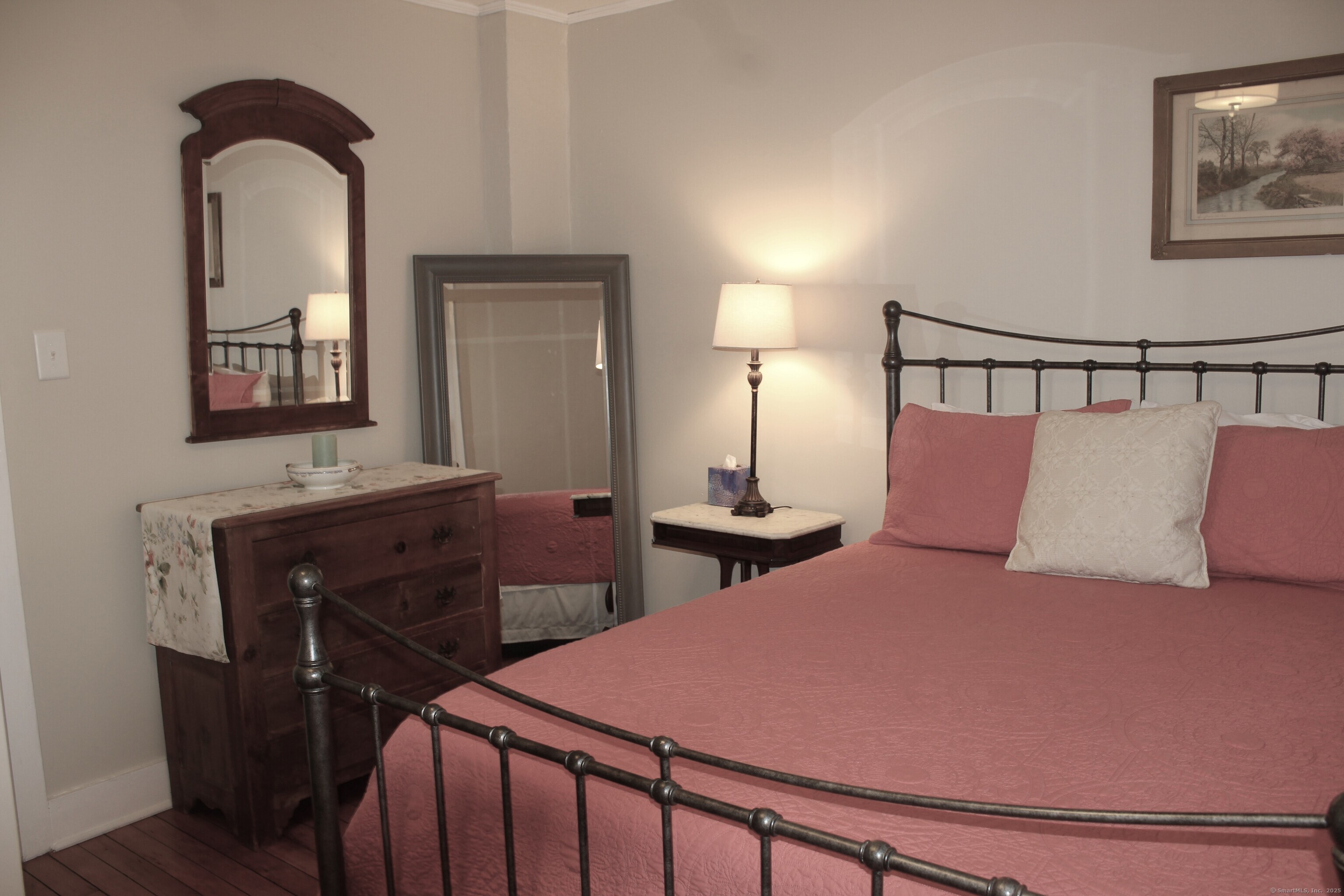 6 West Main Street Chester, CT 06412 - Photo 34 of 37 a bedroom with a bed and a dresser