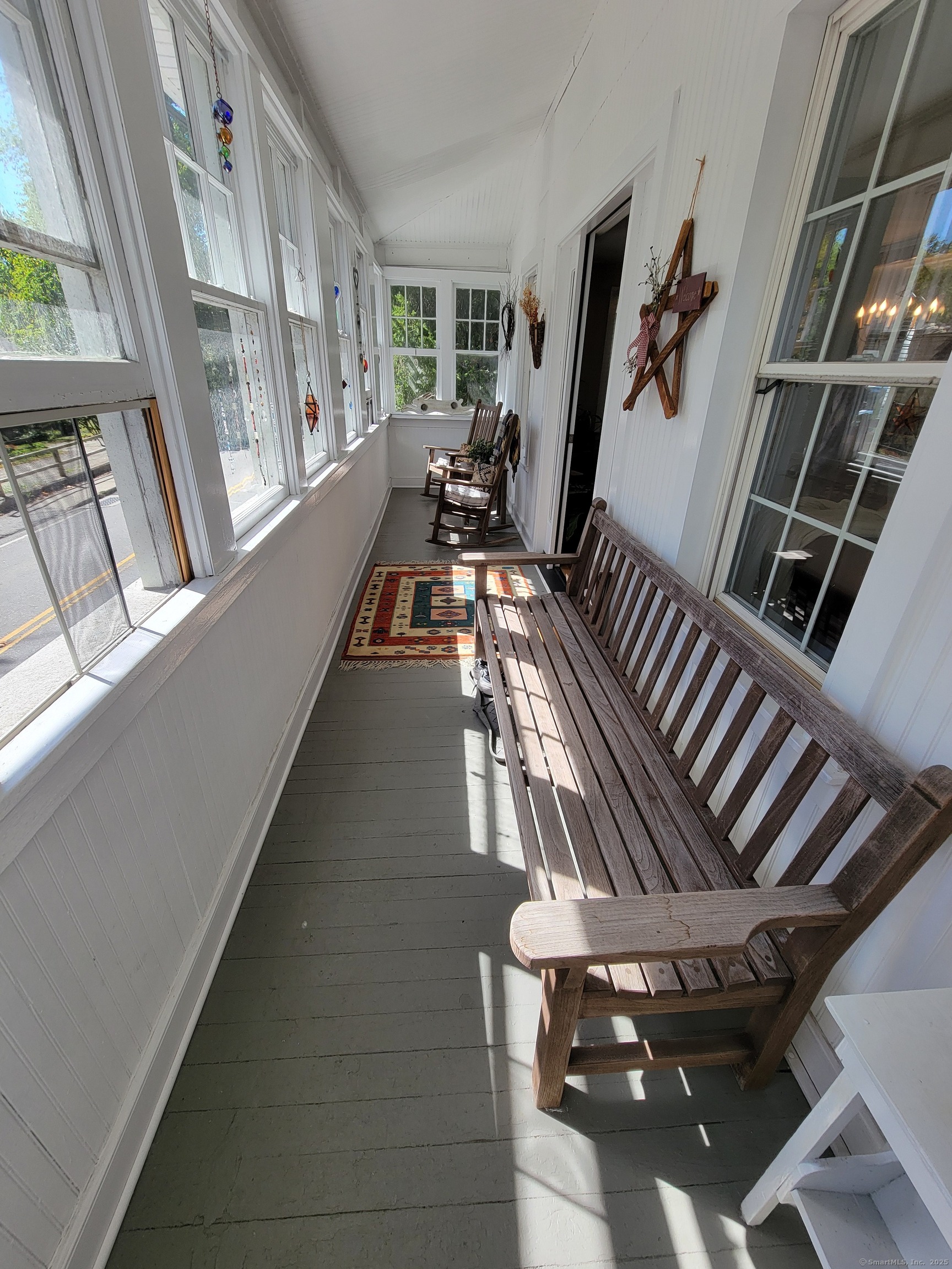 6 West Main Street Chester, CT 06412 - Photo 5 of 37 a view of an entryway with wooden floor