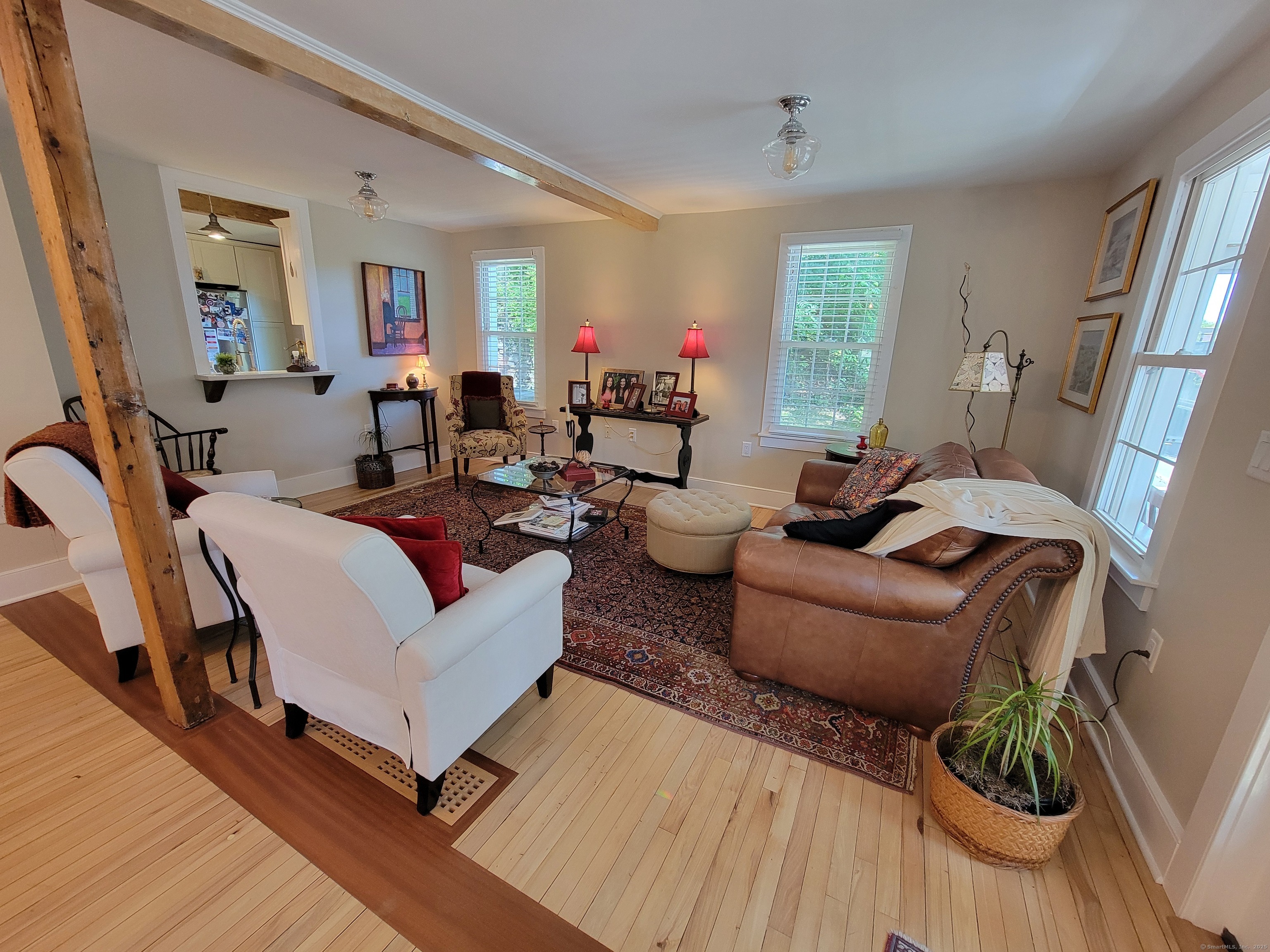 6 West Main Street Chester, CT 06412 - Photo 8 of 37 a living room with furniture and wooden floor