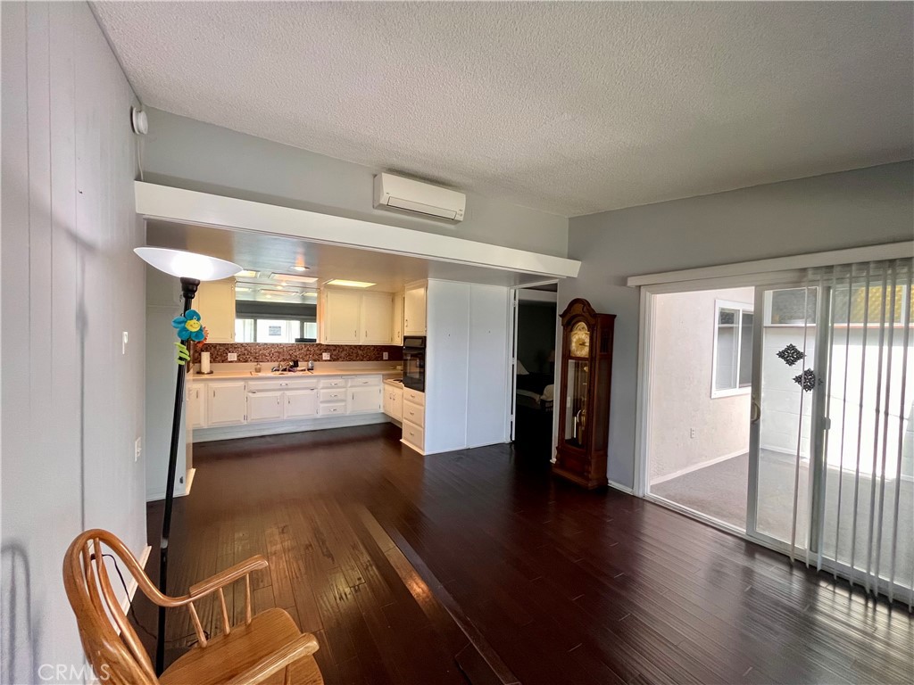 1842 Thunderbird Drive, Unit 1C Seal Beach, CA 90740 - Photo 16 of 16 a view of a living room and dining room