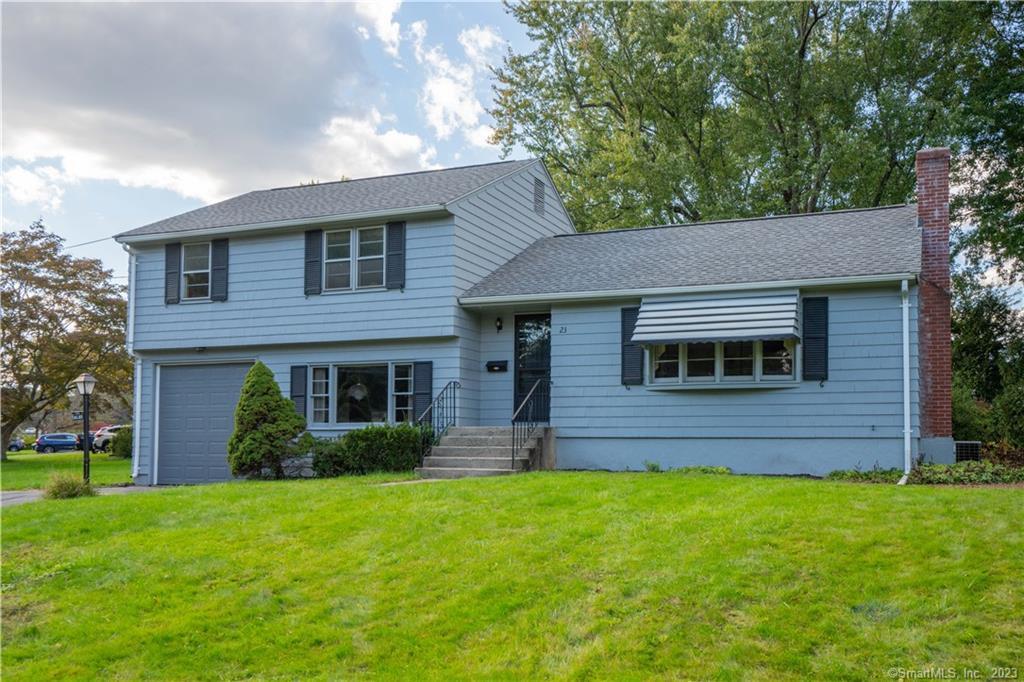 23 Skonet Road West Hartford, CT 06117 - Photo 1 of 1 a view of house with backyard and garden