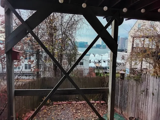 a view of living room with furniture and a table