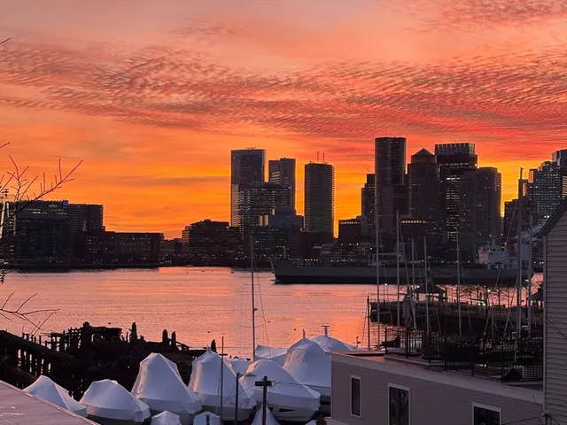 a view of a city with a building in the background