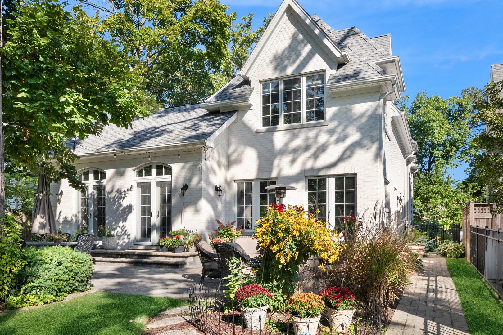 1317 Maple Avenue Wilmette, IL 60091 - Photo 5 of 15 a front view of a house with a yard