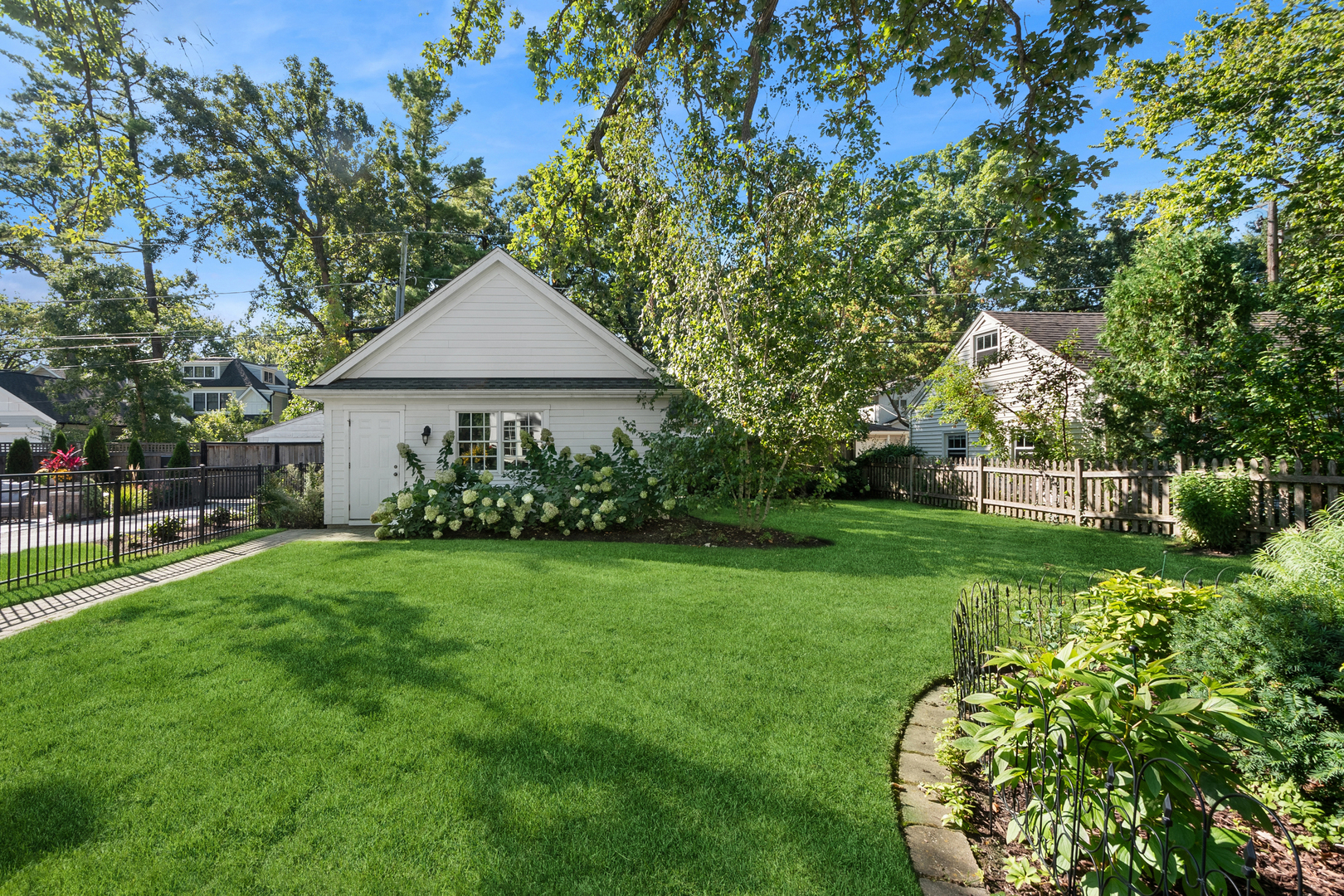 1317 Maple Avenue Wilmette, IL 60091 - Photo 10 of 15 a front view of a house with garden