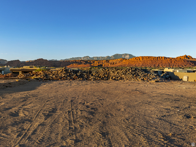 0 St. George, UT 84770 - Photo 1 of 25 Expansive undeveloped land with a backdrop of rugged red rock formations and distant mountains