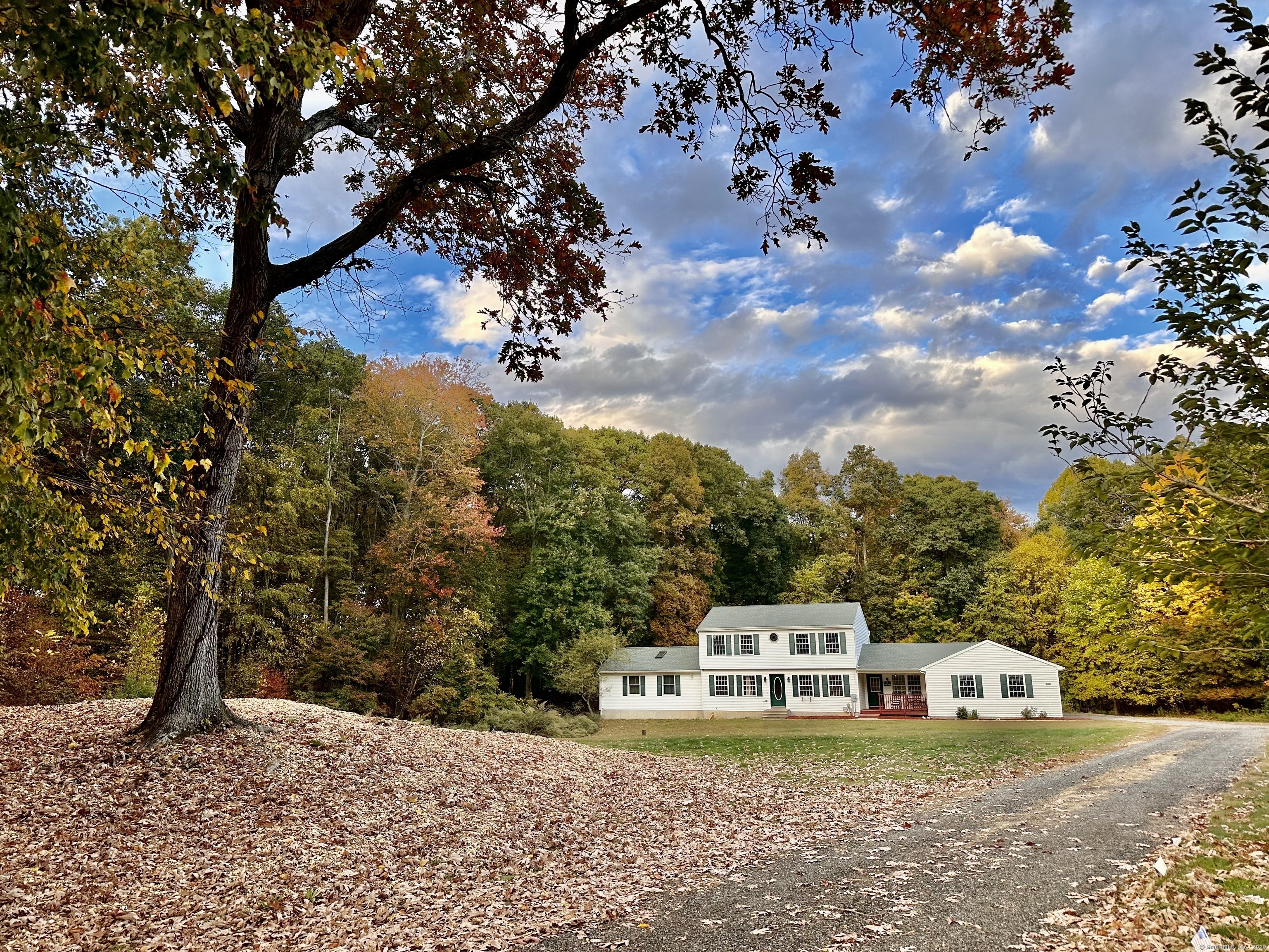 288 Leonard Bridge Road Lebanon, CT 06249 - Photo 1 of 14 a picture of a houses with a yard