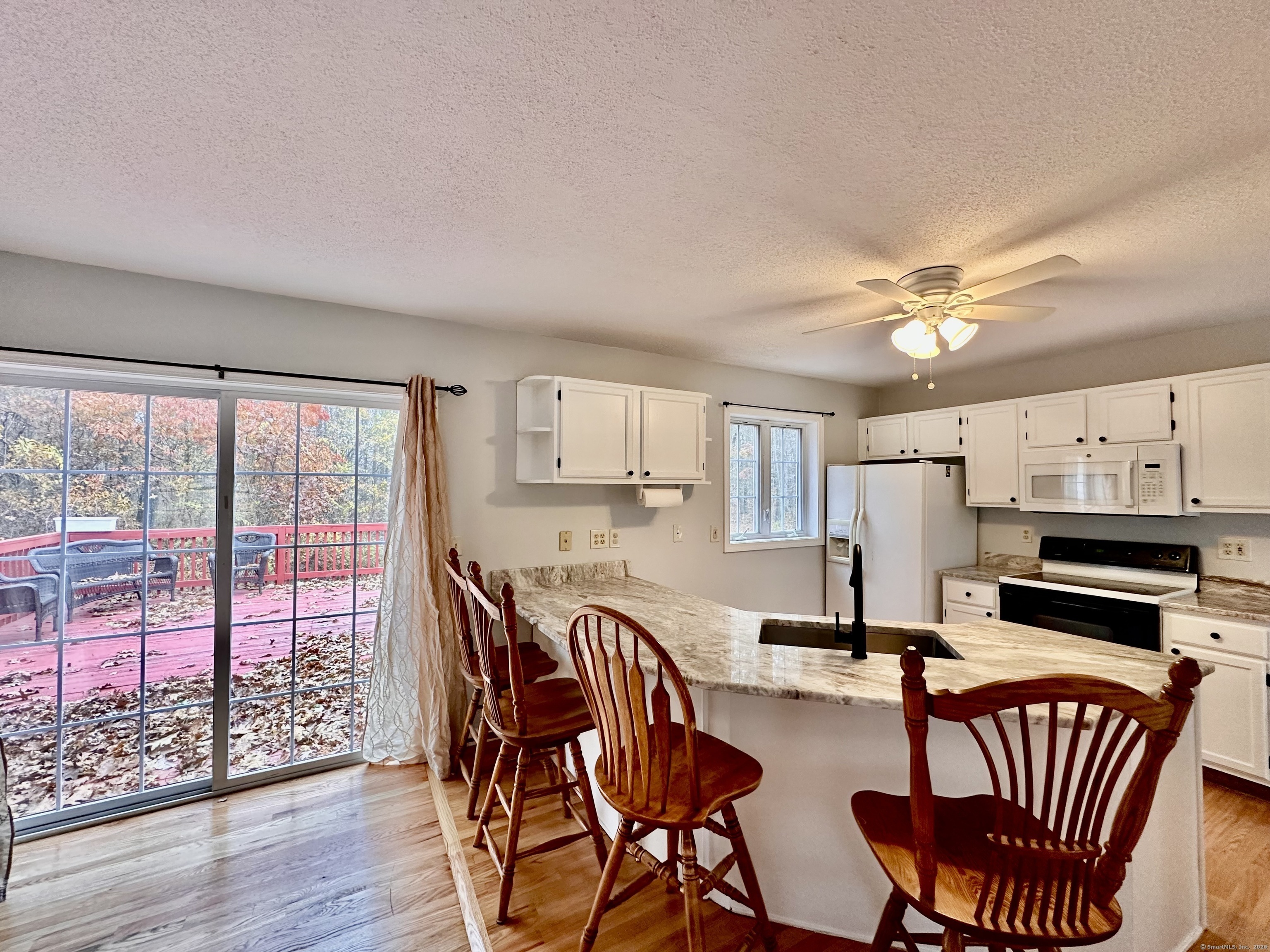 288 Leonard Bridge Road Lebanon, CT 06249 - Photo 5 of 14 a dining room with furniture and wooden floor