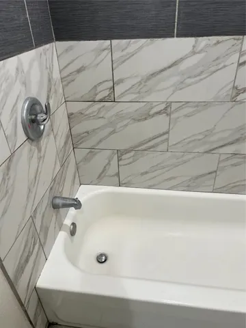a bathroom with a bathtub