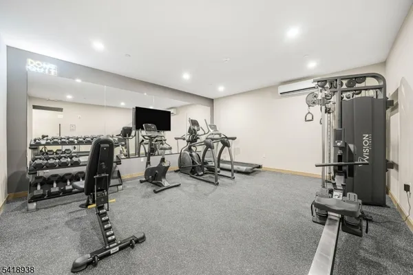 a view of a room with gym equipment