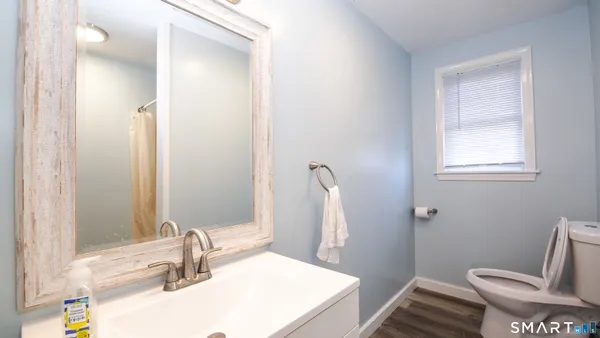 a bathroom with a sink and a vanity