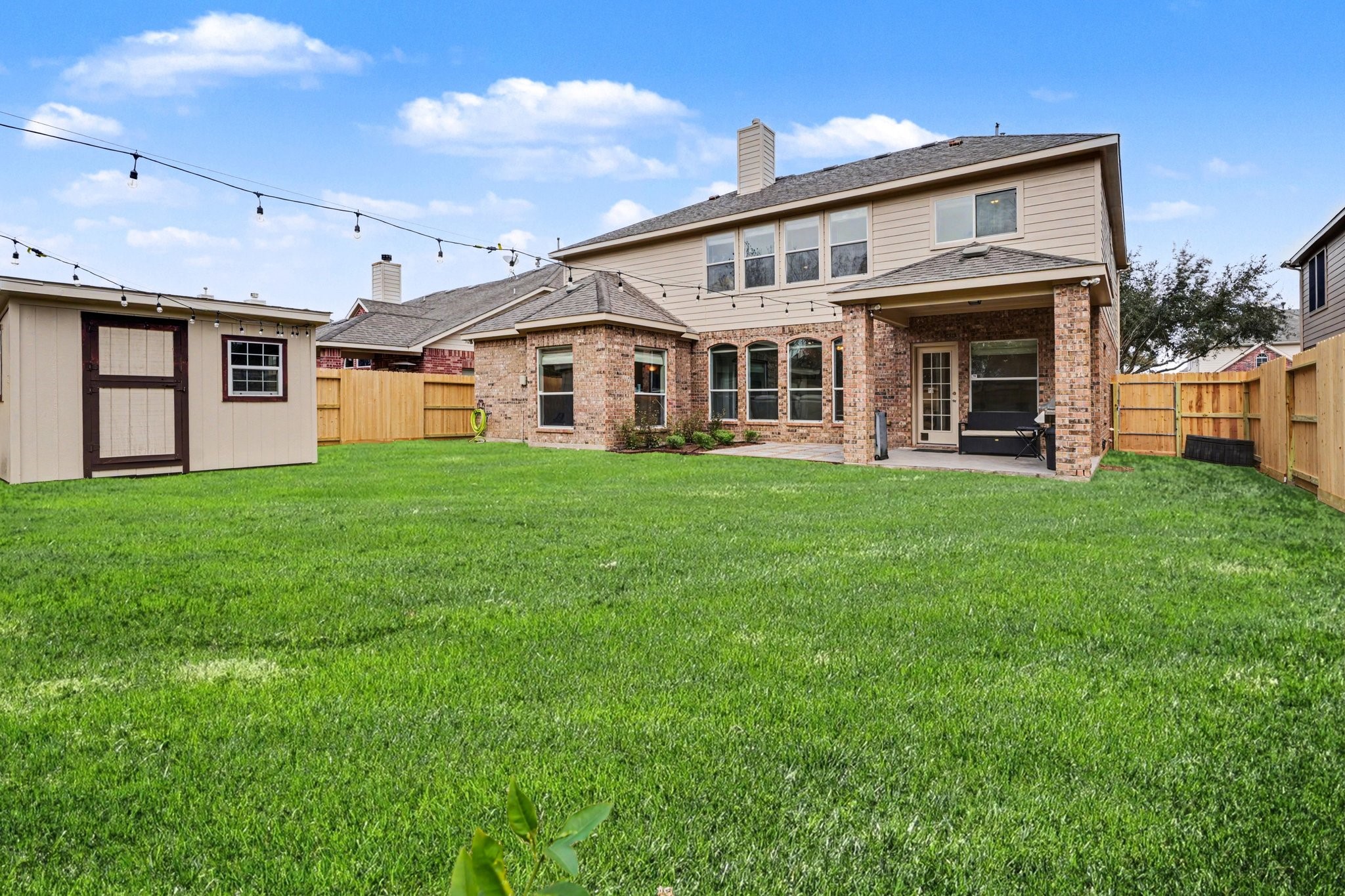 806 Dawn Ridge Way Seabrook, TX 77586 - Photo 34 of 39 a front view of a house with a yard and porch