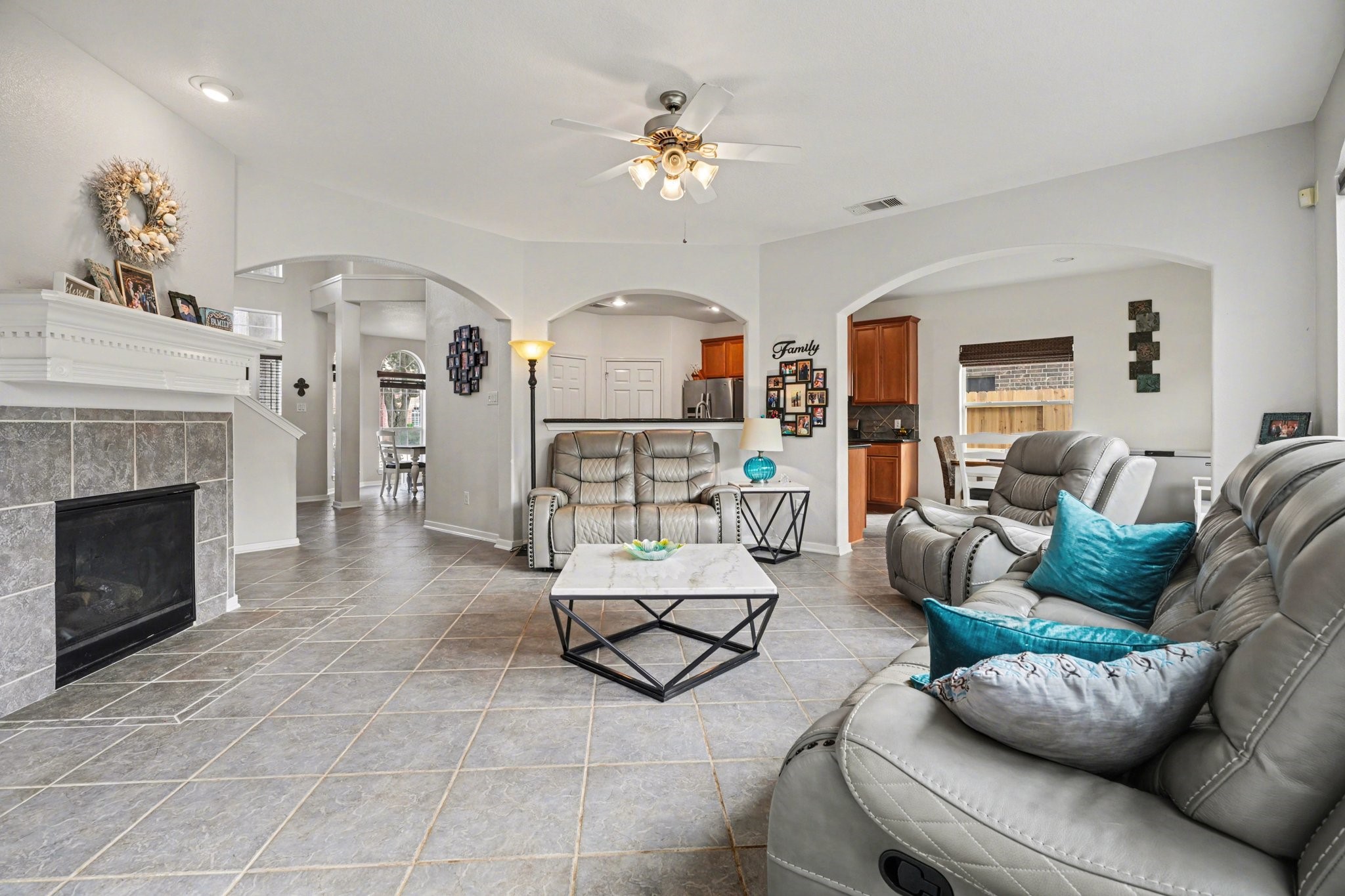 806 Dawn Ridge Way Seabrook, TX 77586 - Photo 36 of 39 a living room with furniture and a fireplace