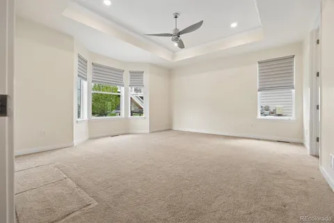 a living room with lots of furniture and a rug