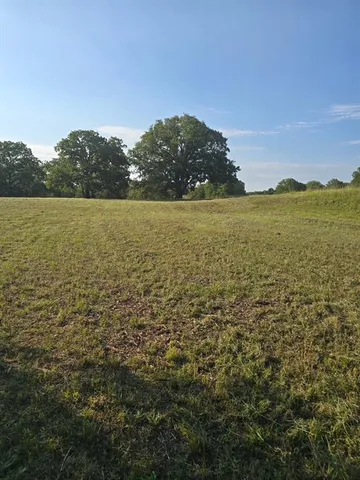 a view of an ocean and mountain